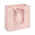 Sac cadeau 30 x 12 x 25 cm en papier rose à motif floral avec ruban en satin